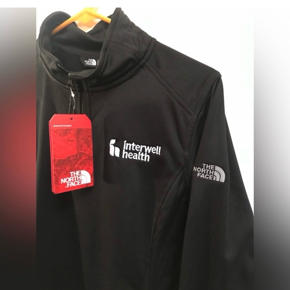 The North Face Black Women's 1/2 zip fleece. Smooth exterior. - Picture 2 of 3
